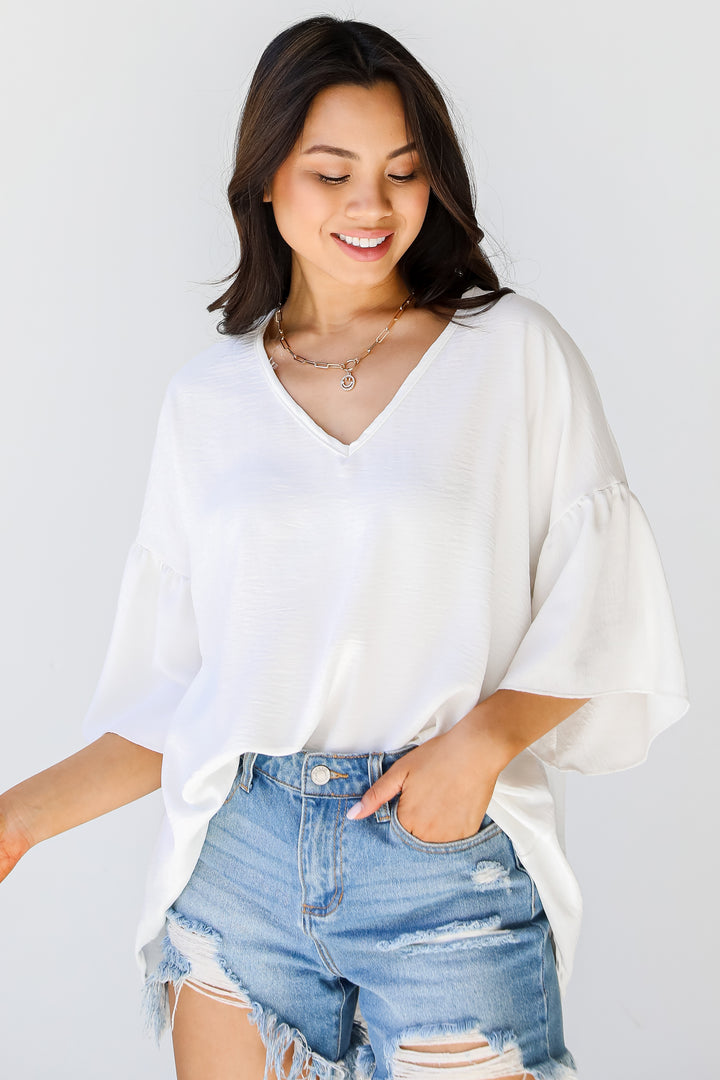 Ruffle Sleeve Blouse in ivory front view