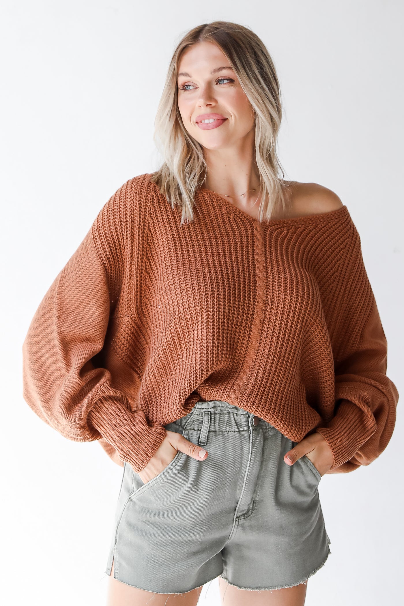 rust sweater on model