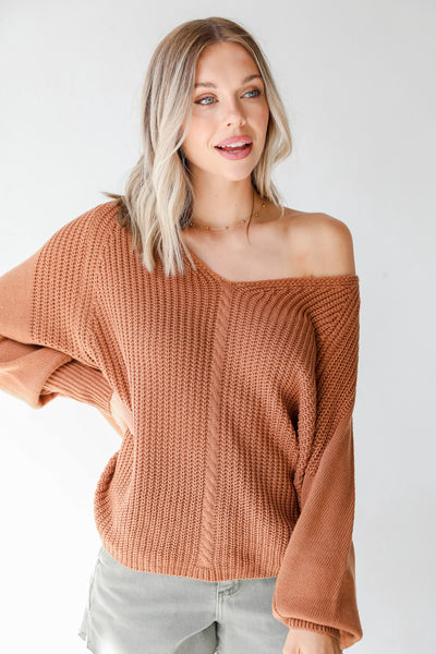 rust sweater on dress up model