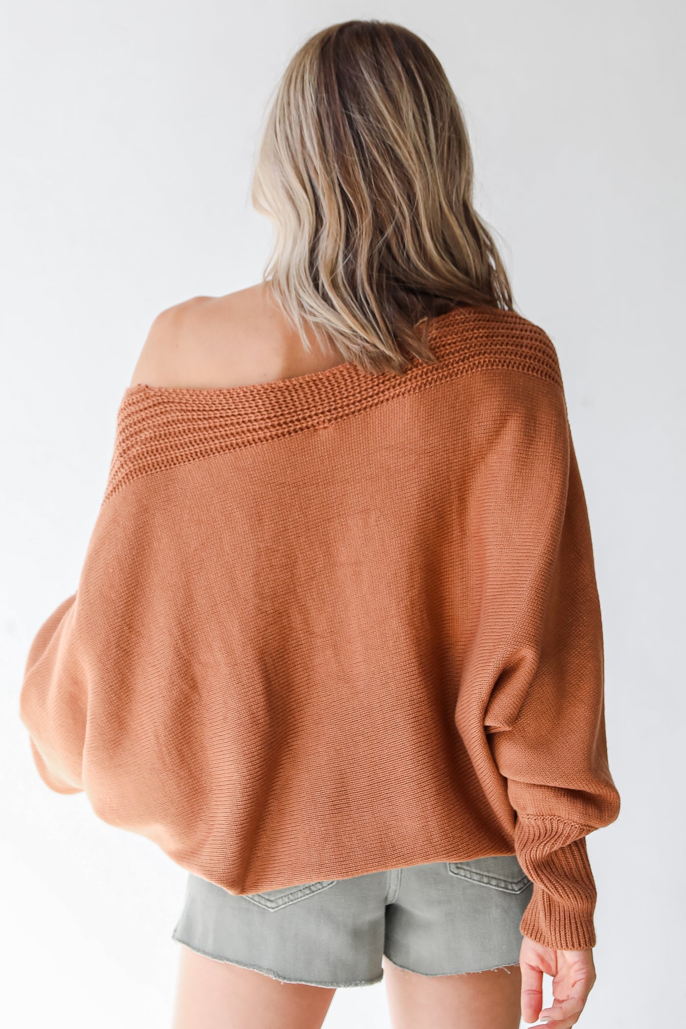 rust sweater back view