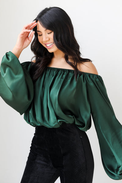 green satin blouse side view