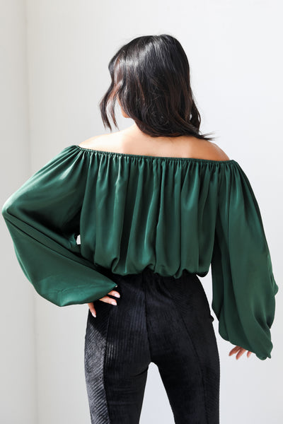 green satin blouse back view