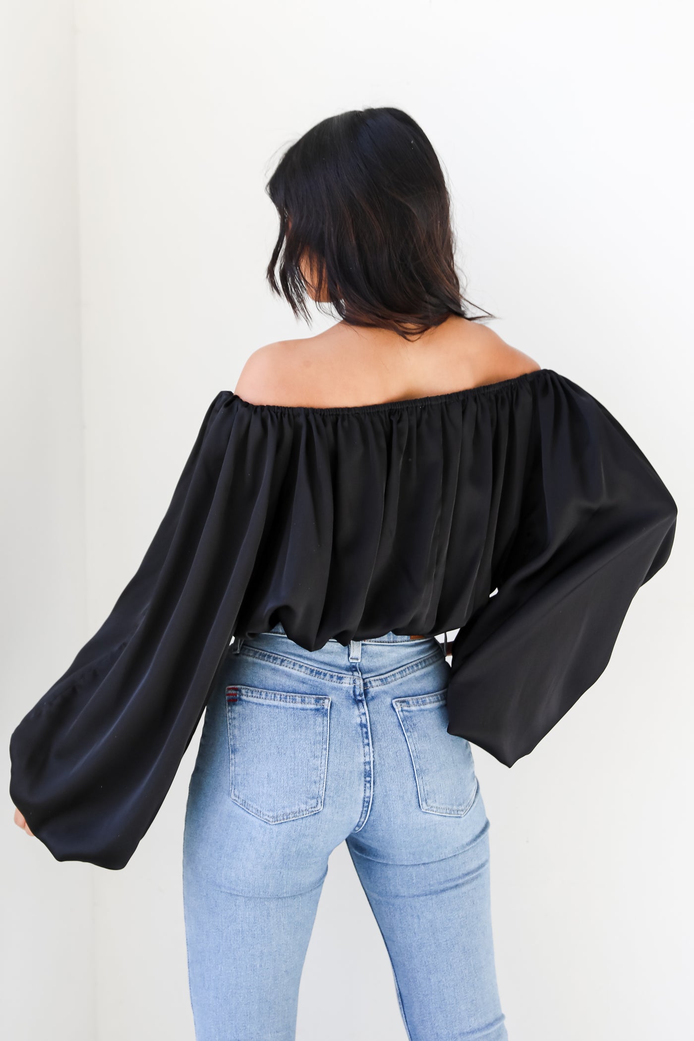 black satin blouse back view