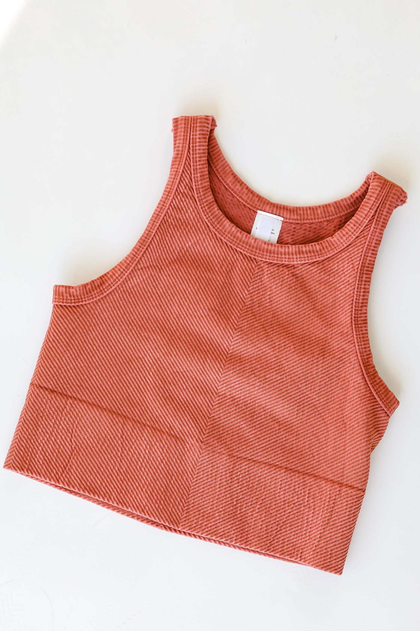 Seamless High Neck Ribbed Tank in clay flat lay