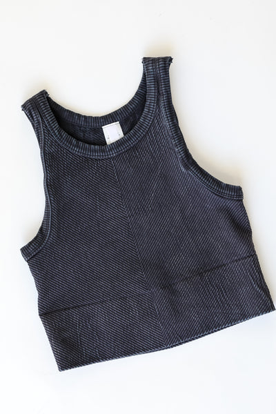 Seamless High Neck Ribbed Tank in black flat lay