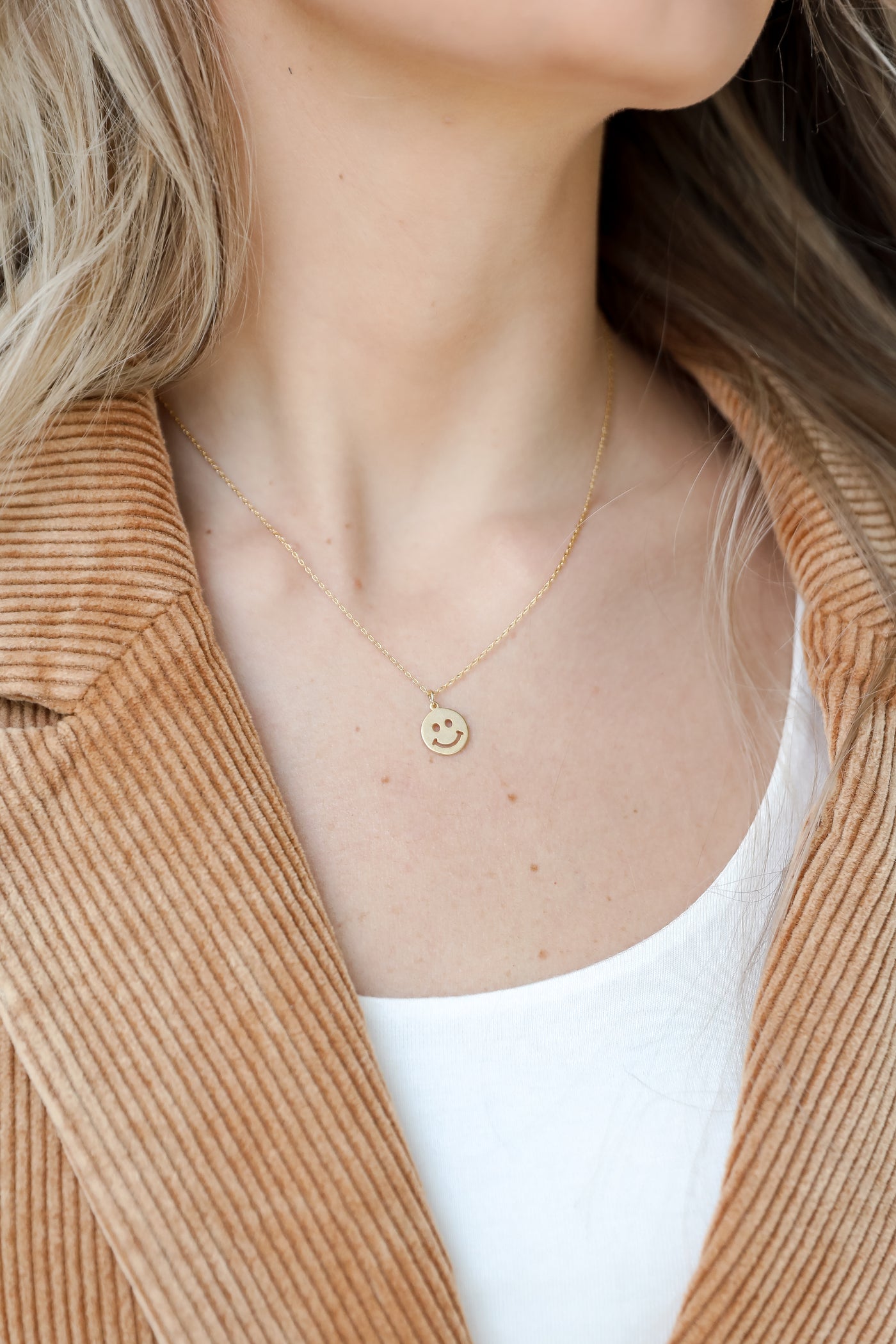 Gold Smiley Face Charm Necklace on model
