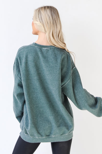 Smiley Face Oversized Pullover in hunter green back view