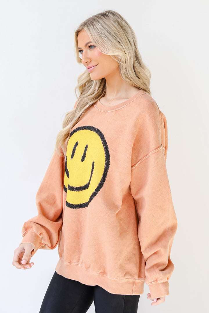 Smiley Face Oversized Pullover in rust side view