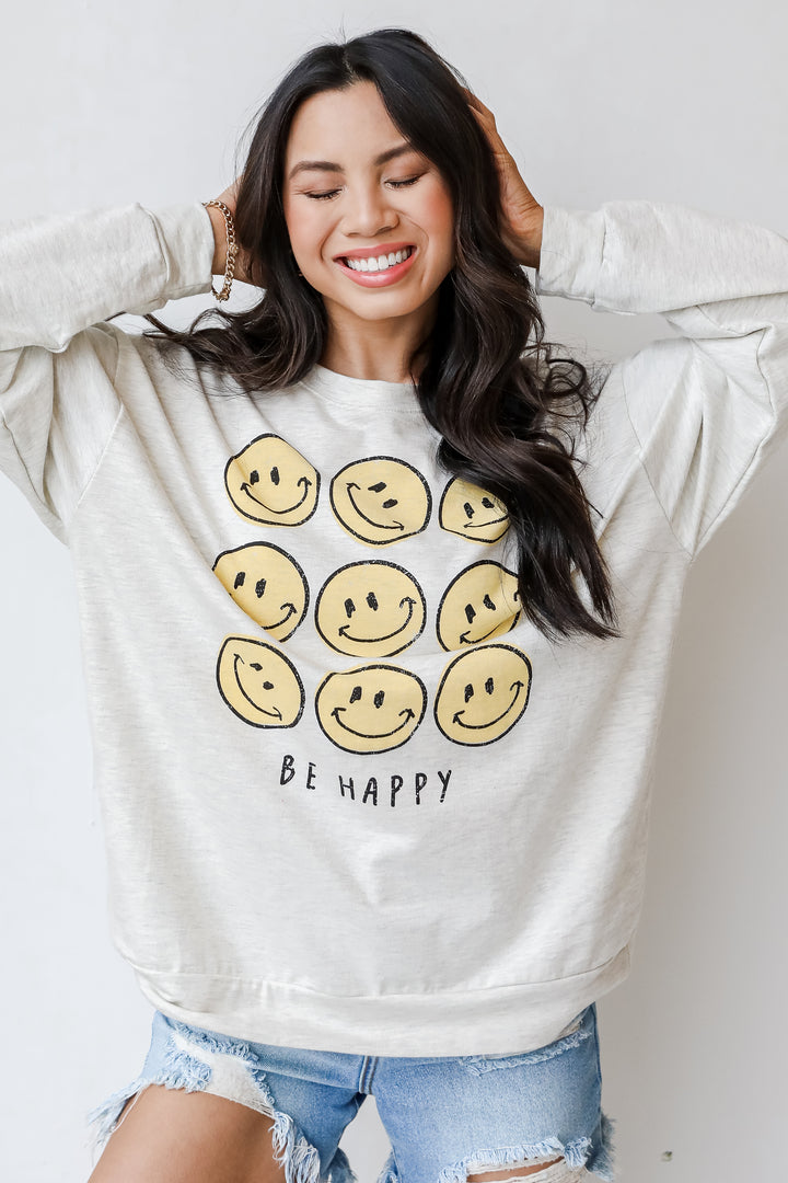 Be Happy Smiley Face Pullover close up