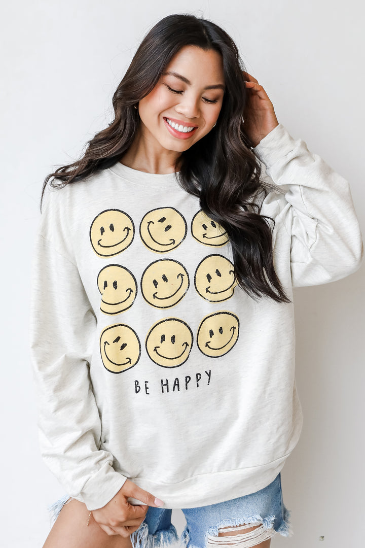 Be Happy Smiley Face Pullover