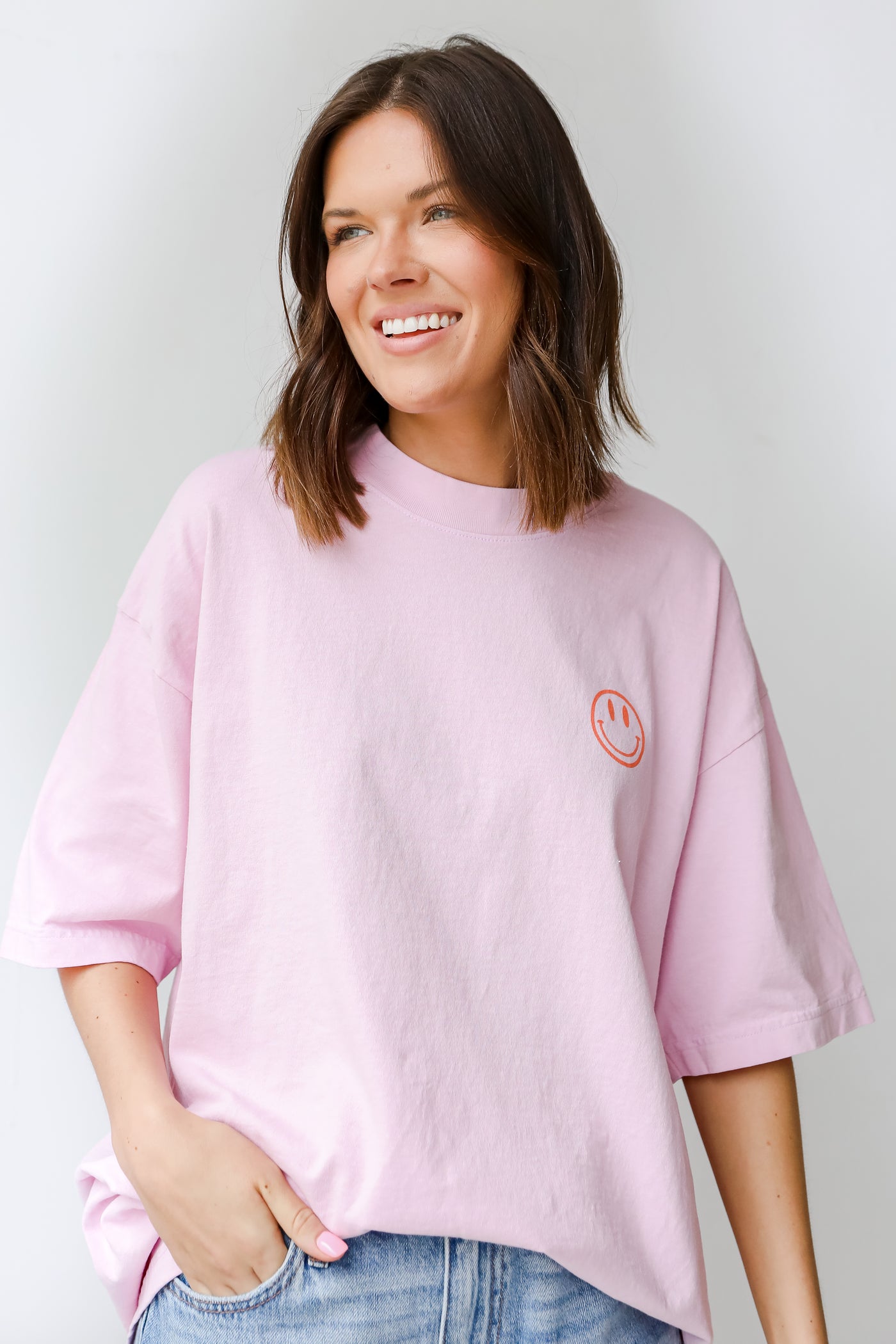 Love Forever Smiley Face Graphic Tee on model
