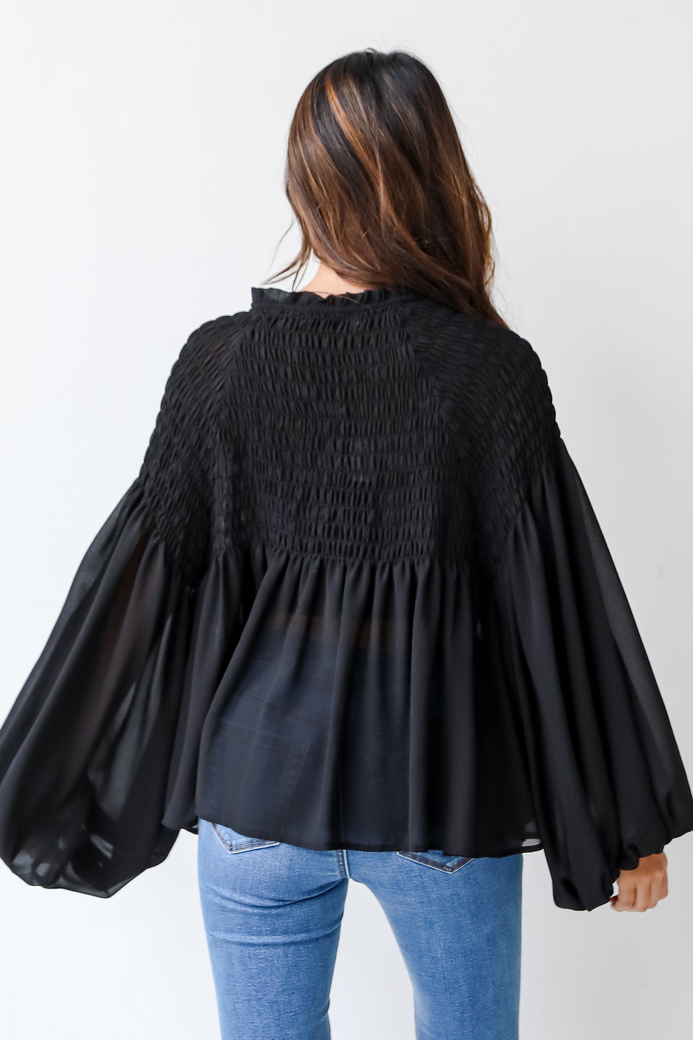 Smocked Blouse in black back view