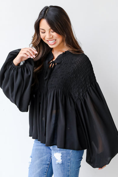 Smocked Blouse in black side view