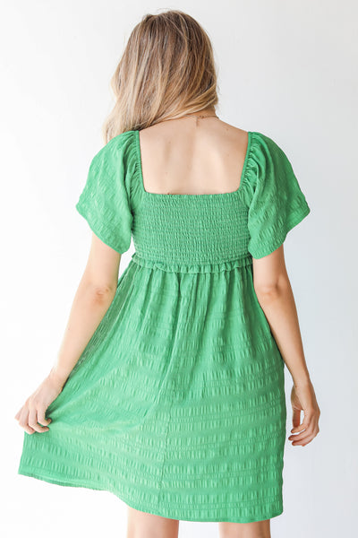 Smocked Mini Dress in green back view