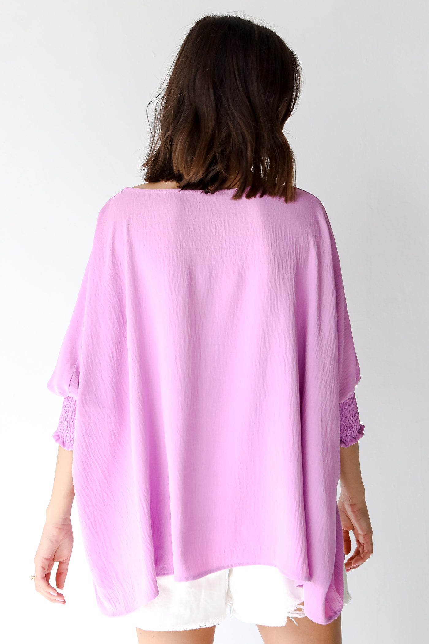 Blouse in lavender back view