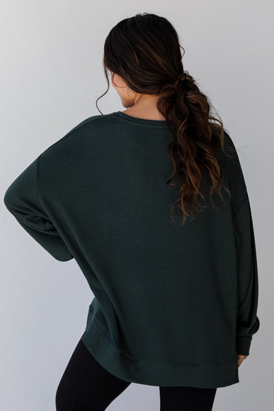 green Pullover back view