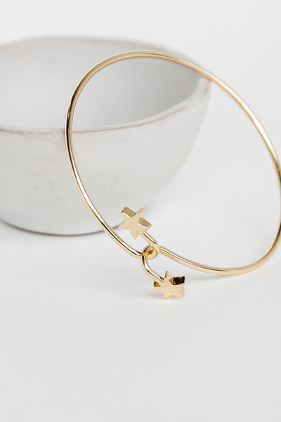 Gold Star Cuff Bracelet flat lay