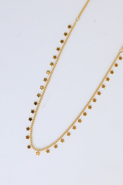Gold Star Charm Necklace close up