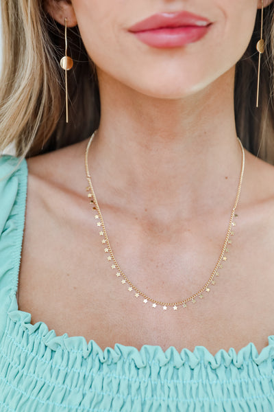 Gold Star Charm Necklace on model