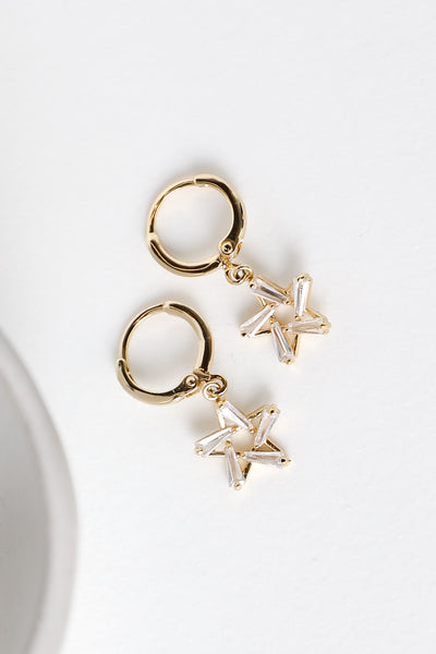 Gold Star Drop Earrings on model
