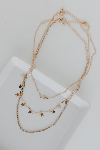 Gold Star + Rhinestone Layered Necklace flat lay