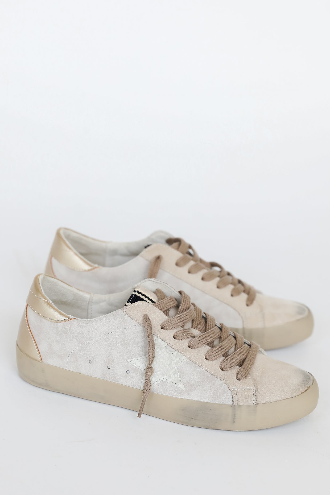 Star Sneakers side view flat lay