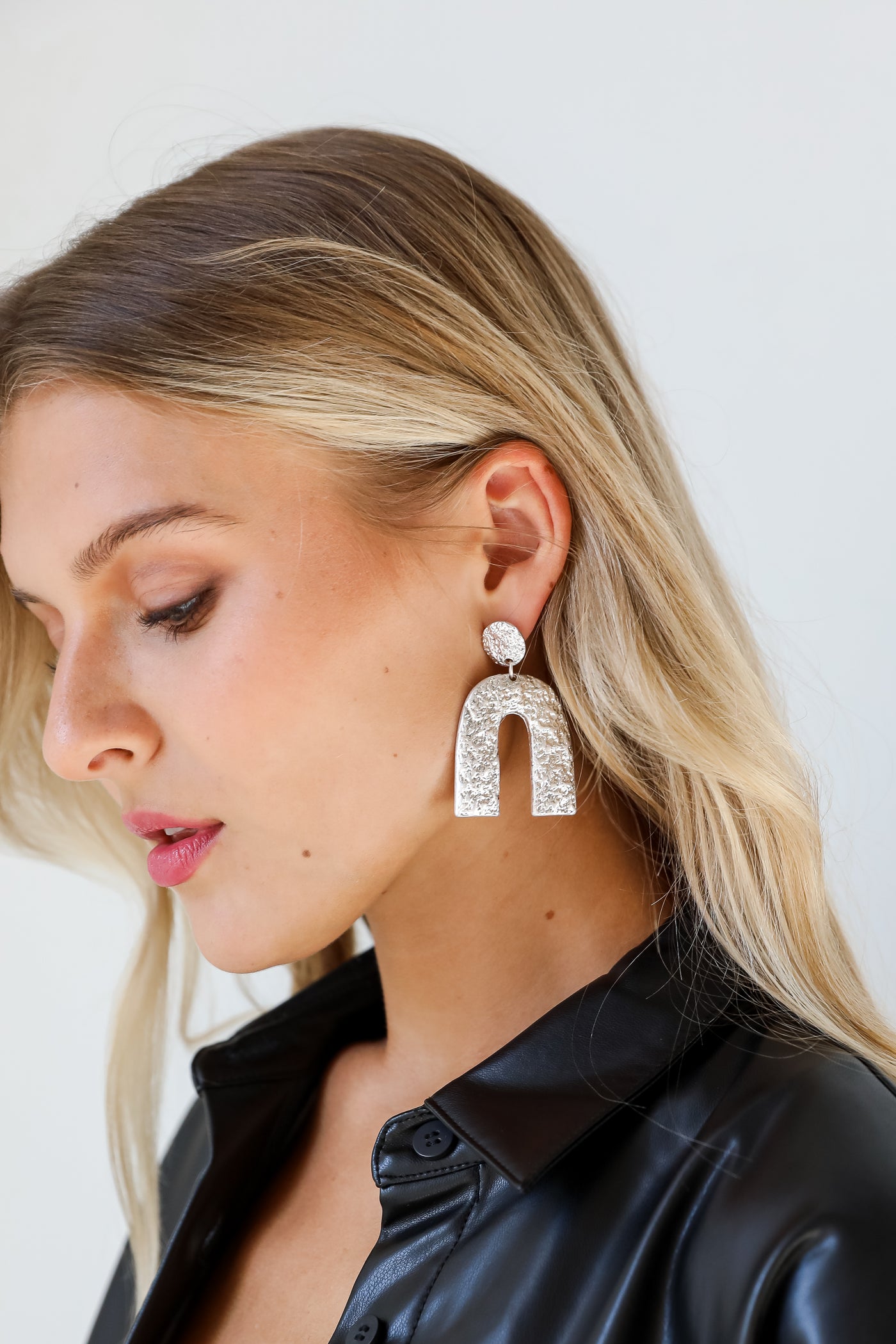 silver Hammered Statement Drop Earrings on model