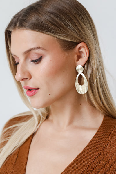Gold Statement Drop Earrings on model