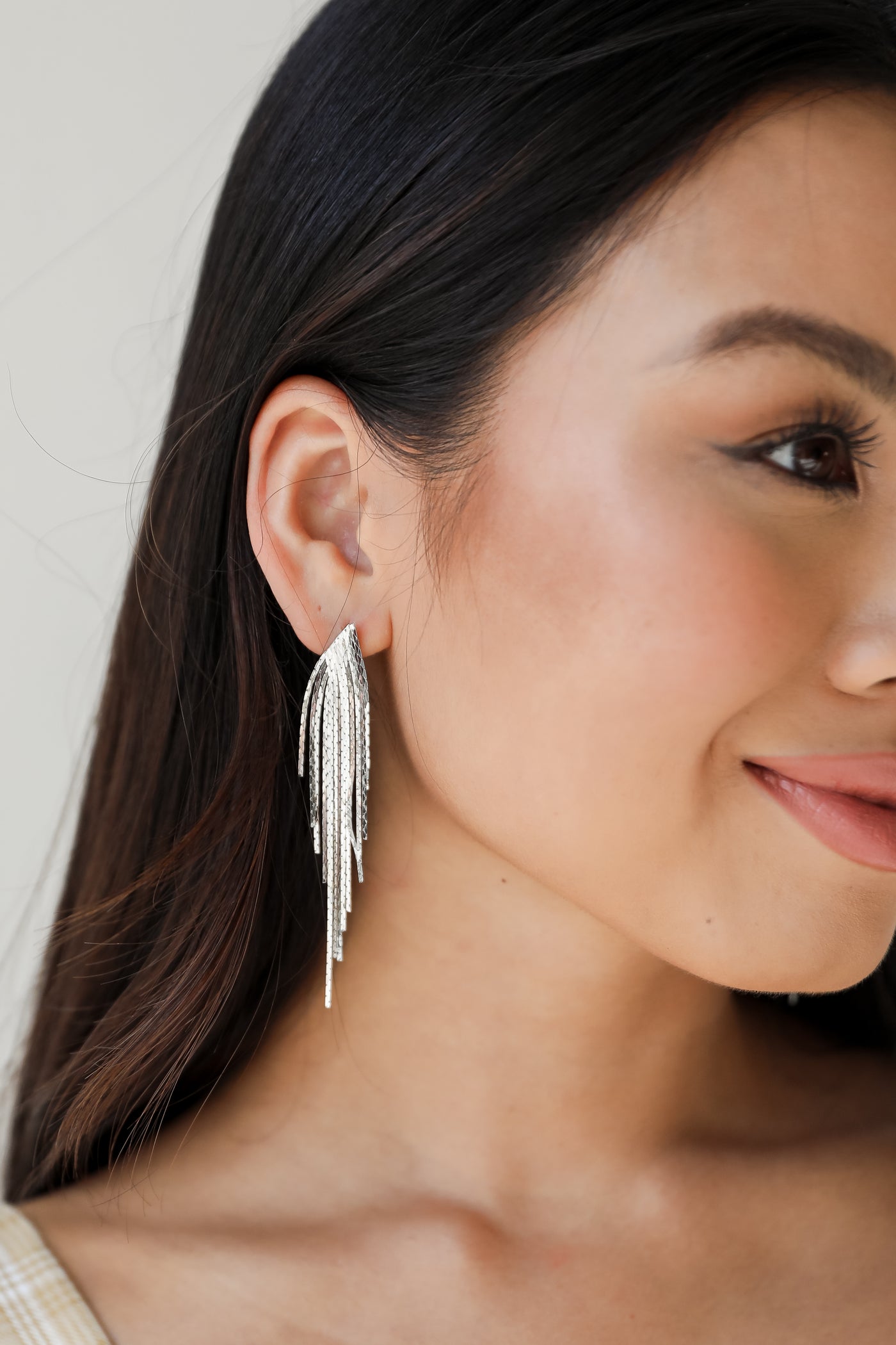 silver Fringe Earrings on model