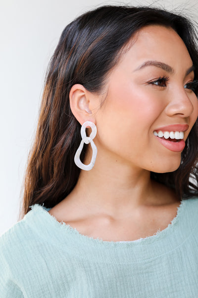 Acrylic Statement Earrings in grey close up