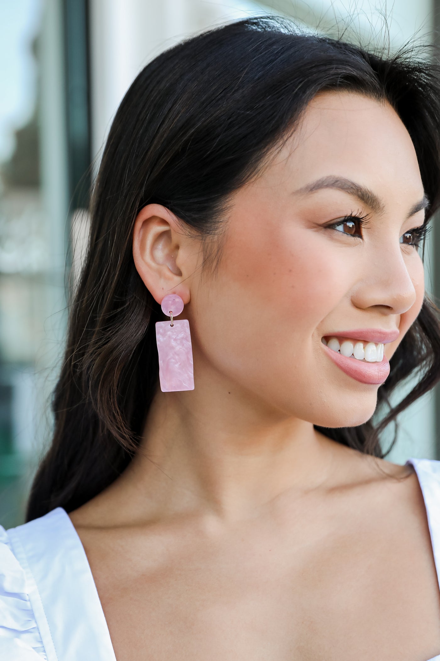 Acrylic Statement Earrings in pink on dress up model
