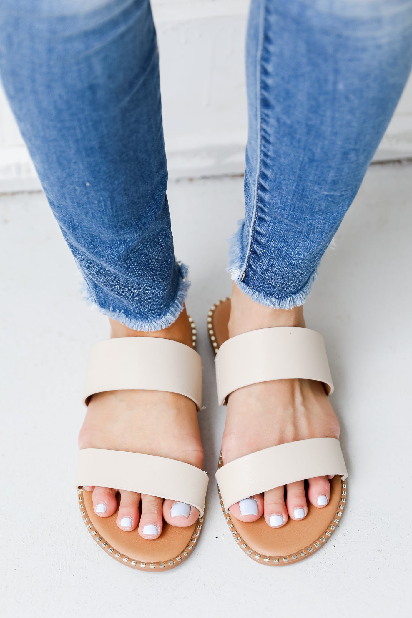 Double Strap Sandals in ivory on model