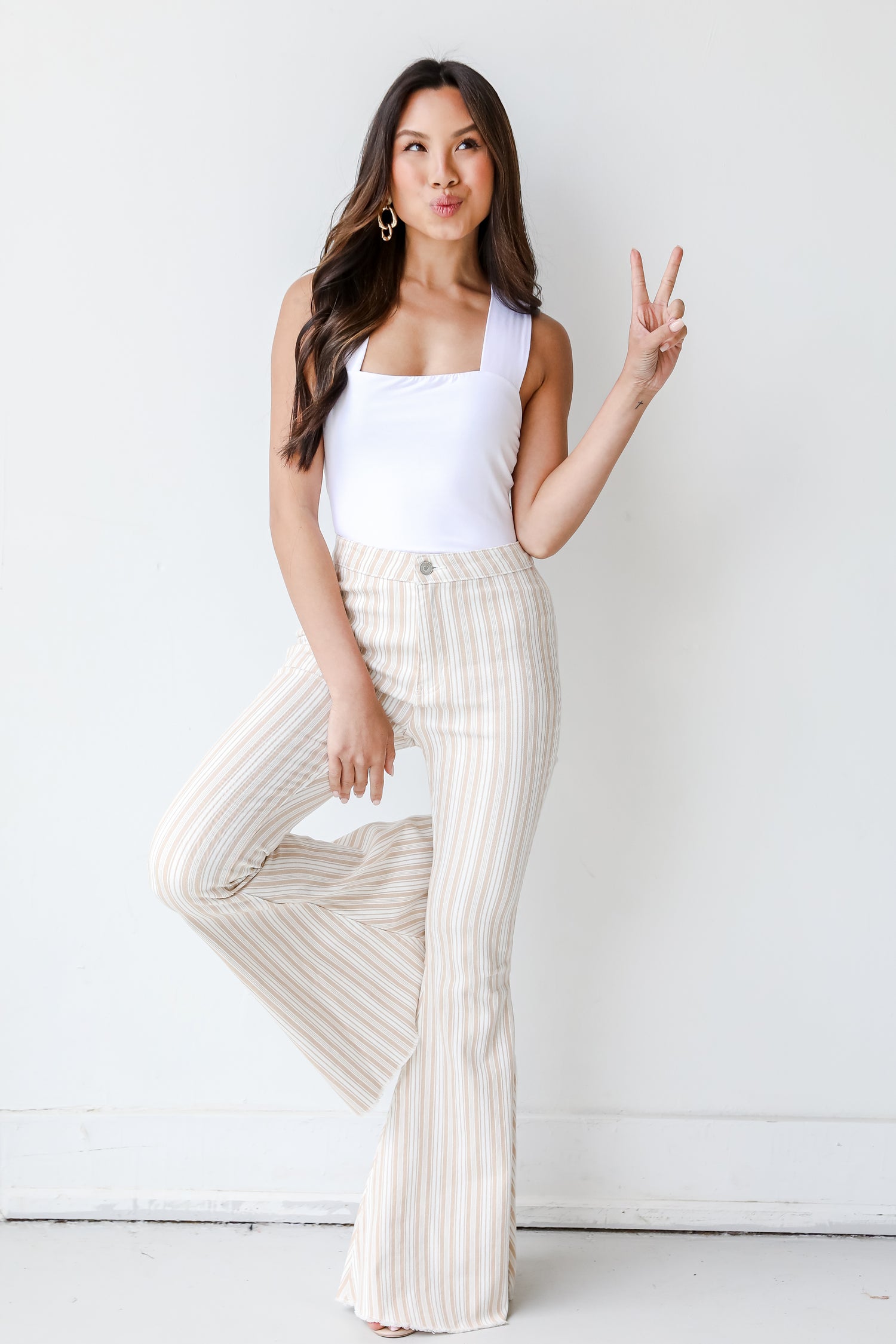 Striped Flare Jeans on model
