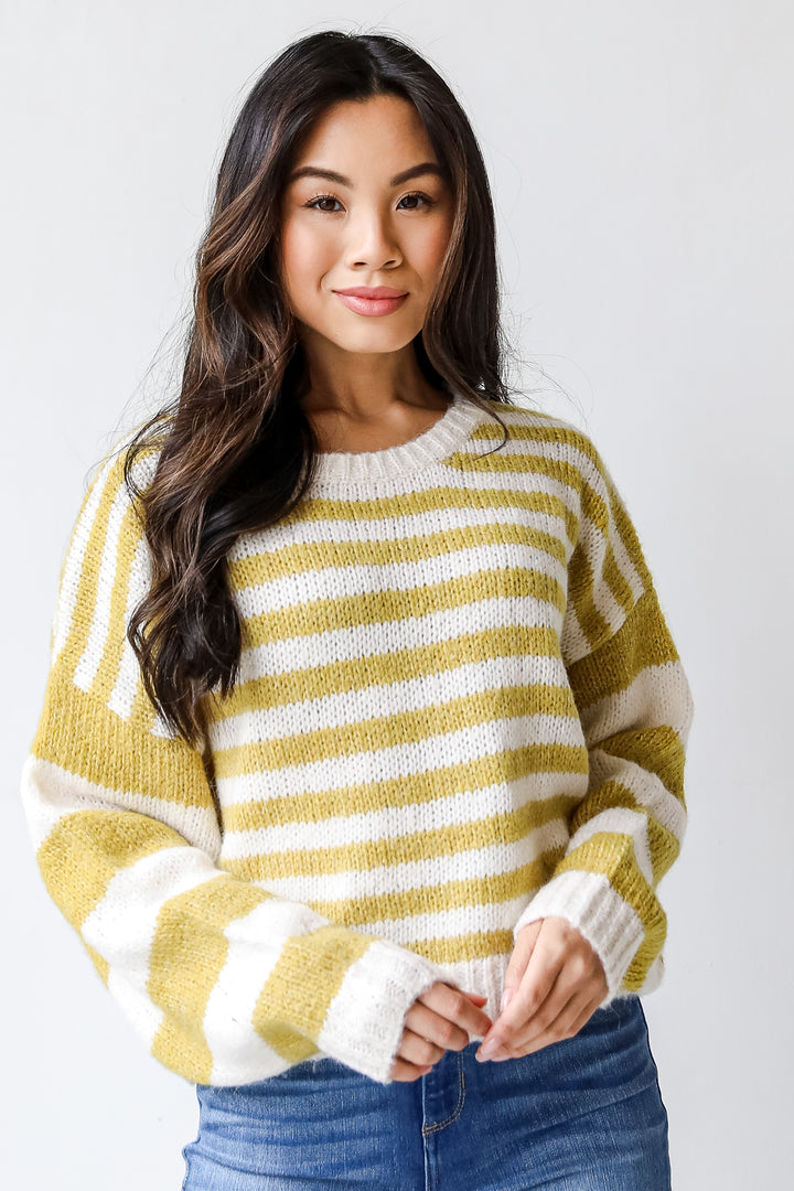 Striped Sweater in mustard on model