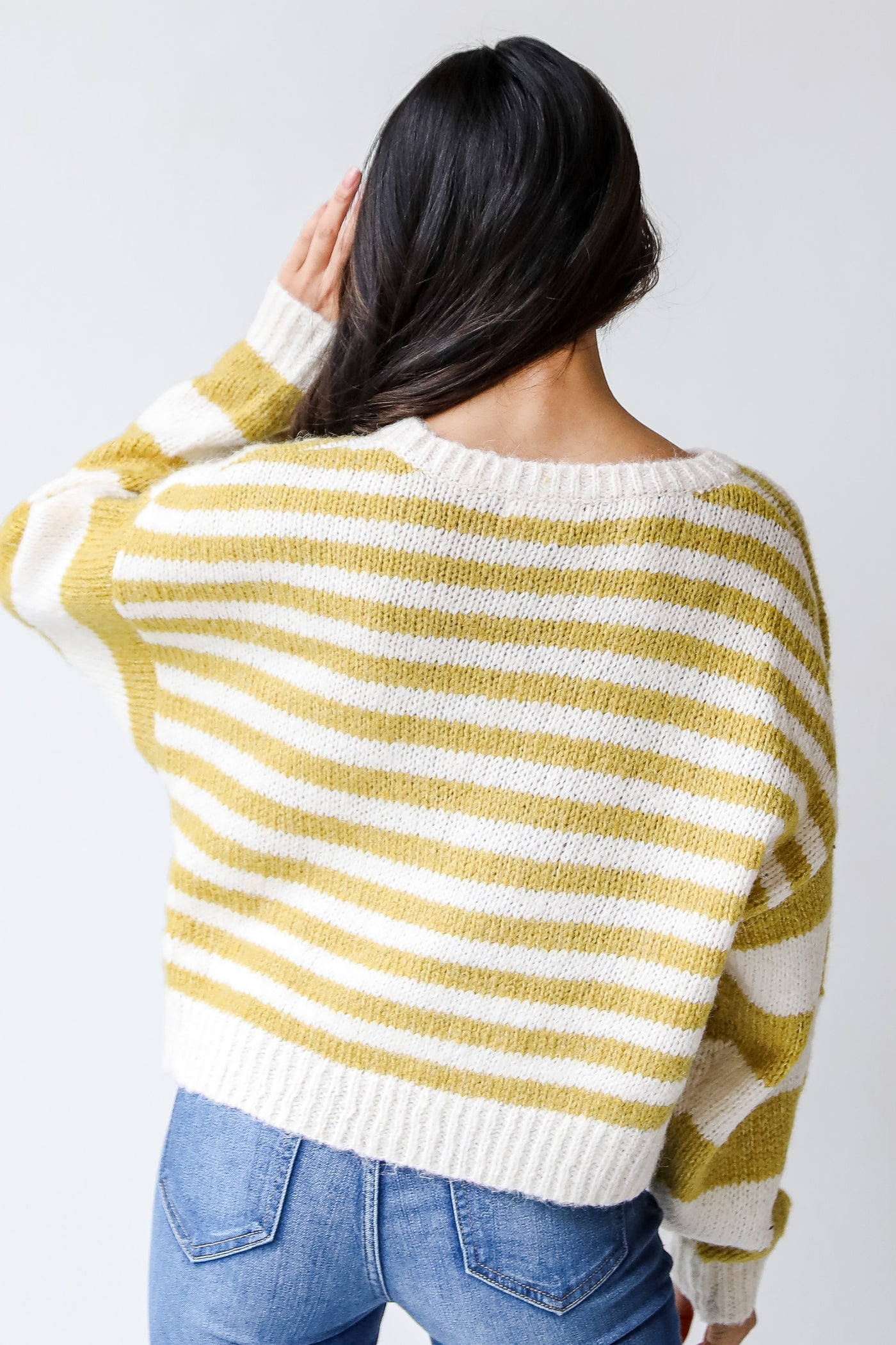 Striped Sweater in mustard back view