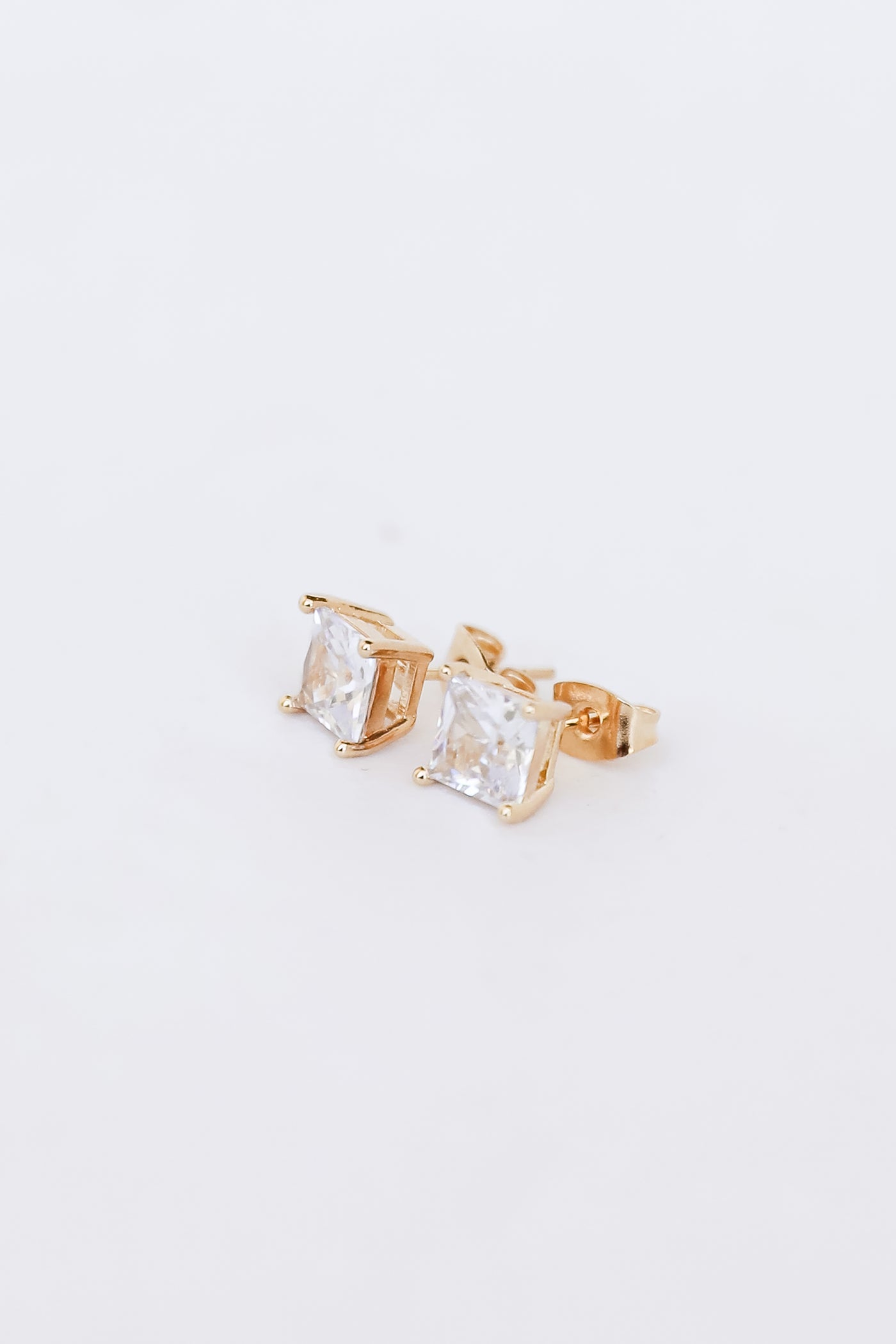 Gold Rhinestone Stud Earrings flat lay