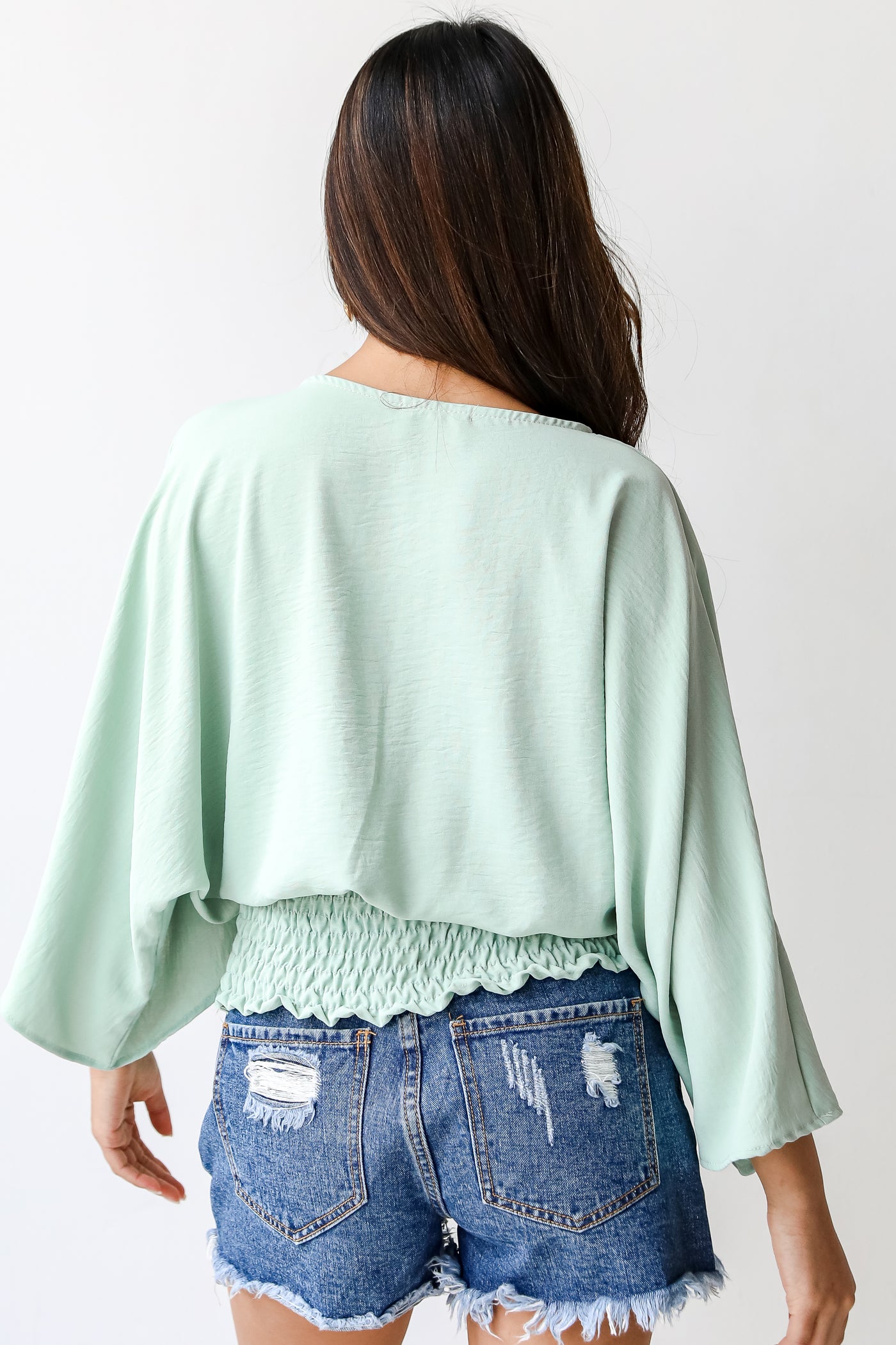 Smocked Surplice Blouse in sage back view
