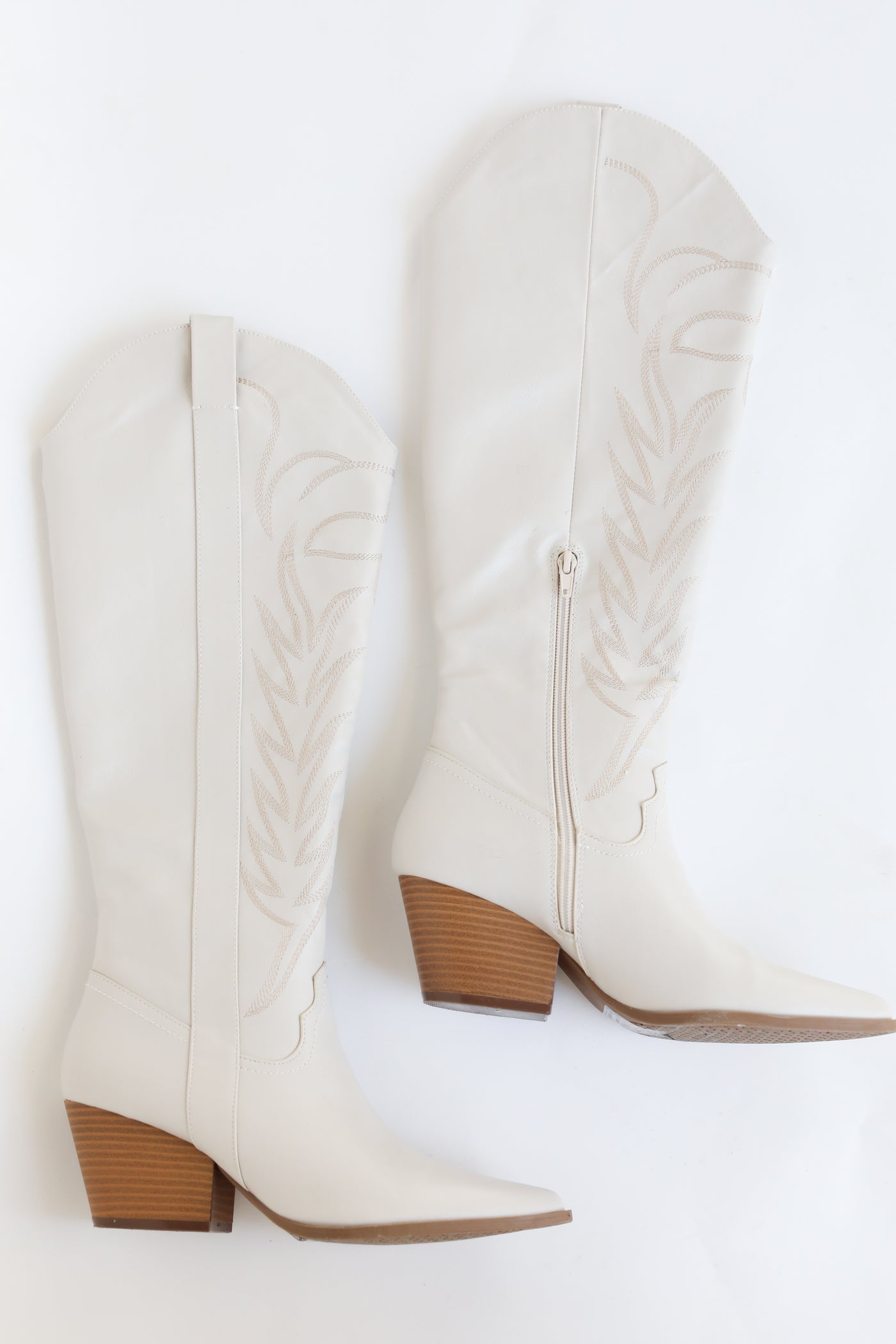 white Western Knee High Boots flat lay