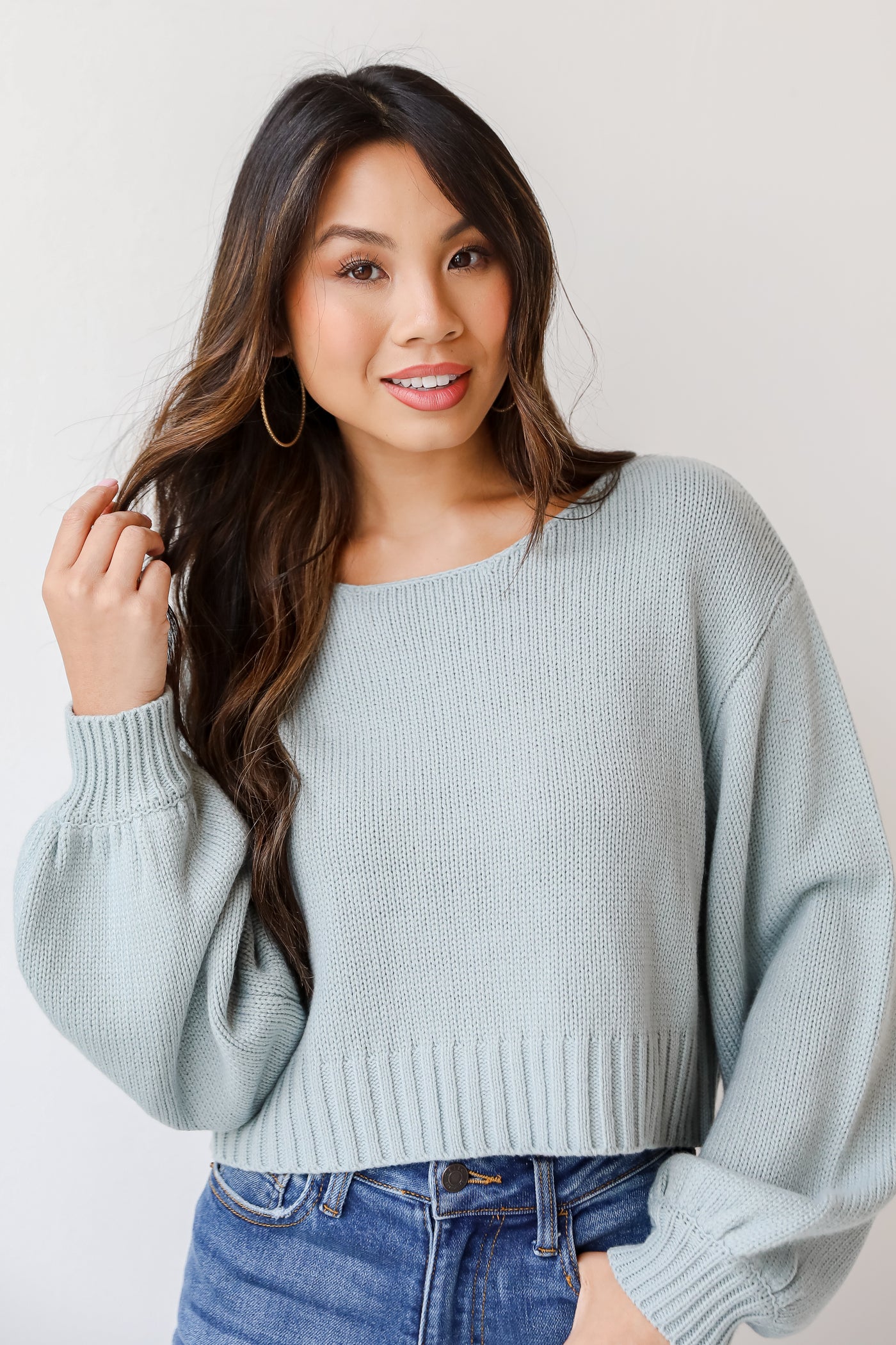blue sweater on model