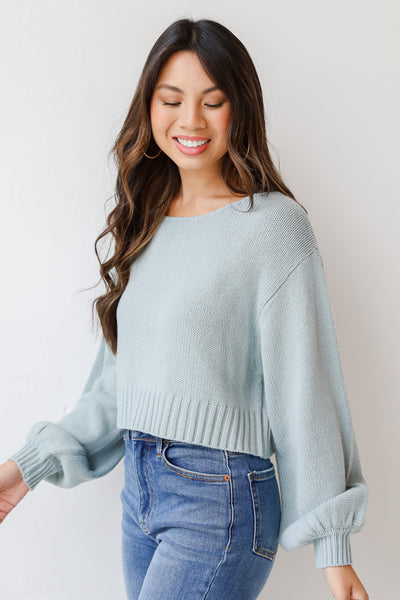 blue sweater side view