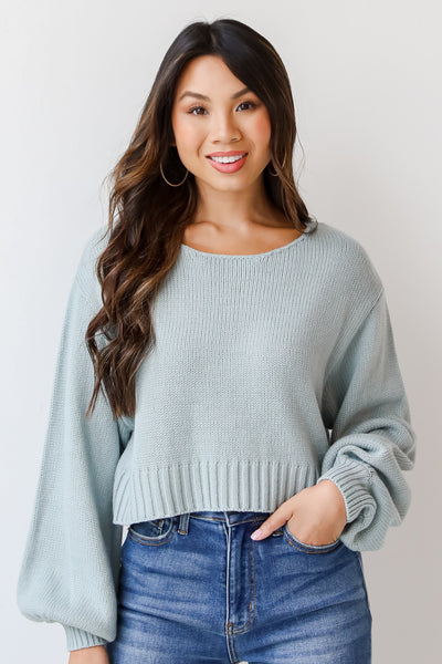 blue cropped sweater on model