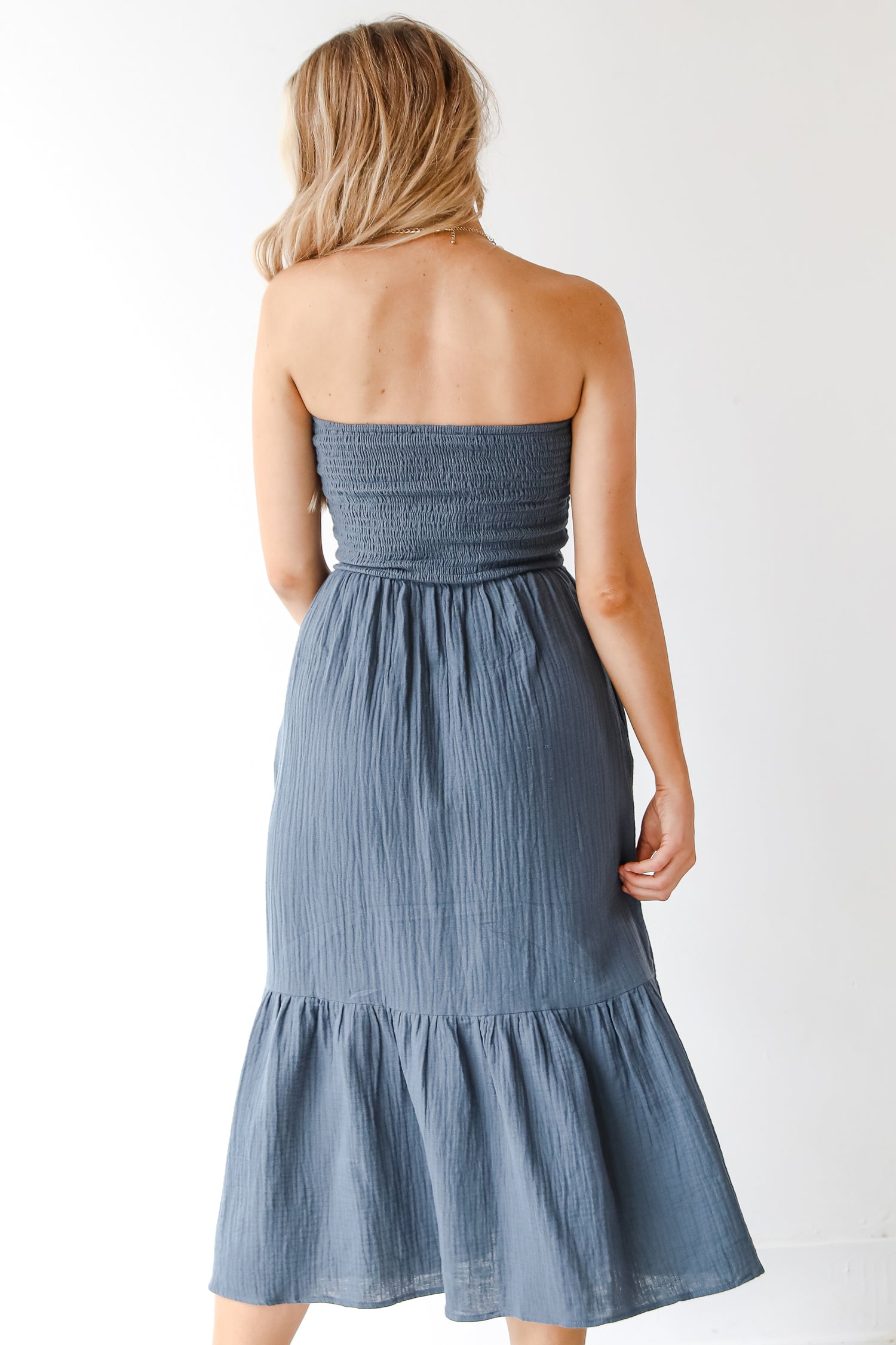 blue linen midi dress back view