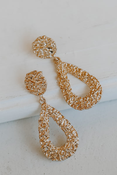 Gold Textured Drop Earrings flat lay