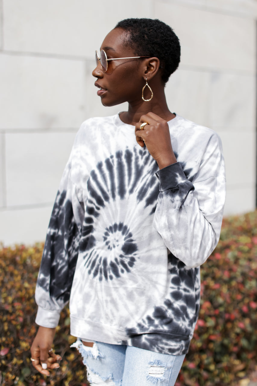 front view of model wearing tie dye pullover 