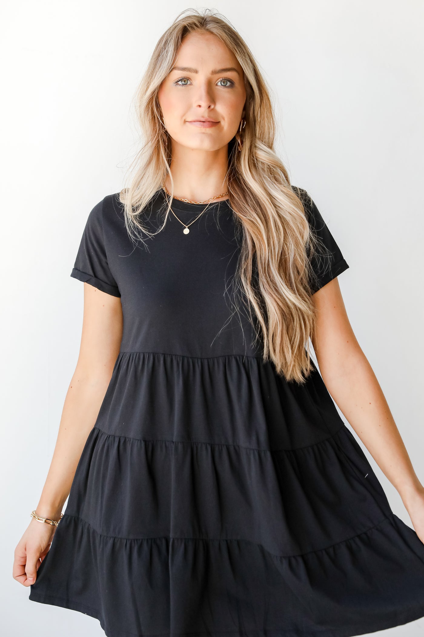 Tiered Mini Dress in black on model
