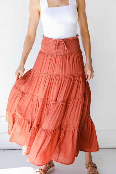 Tiered Maxi Skirt in rust on model