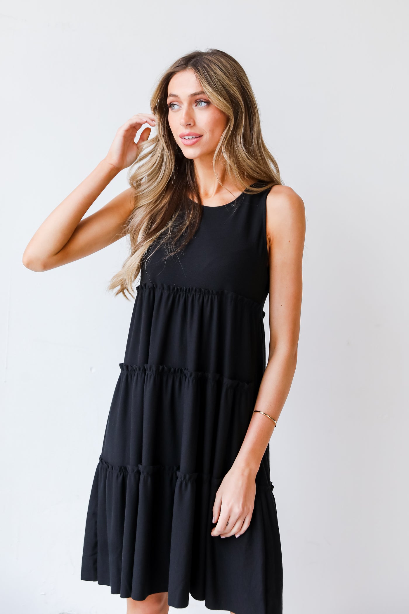 black Tiered Mini Dress on model