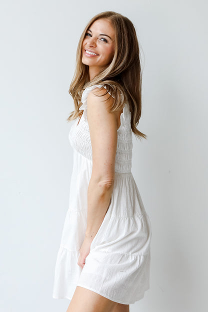 Smocked Tiered Mini Dress in ivory side view
