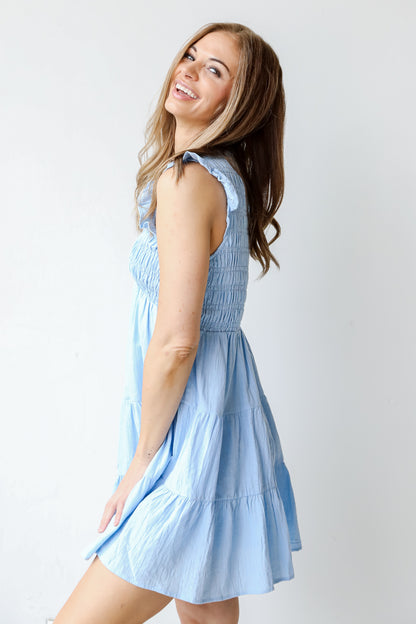 Smocked Tiered Mini Dress in blue side view