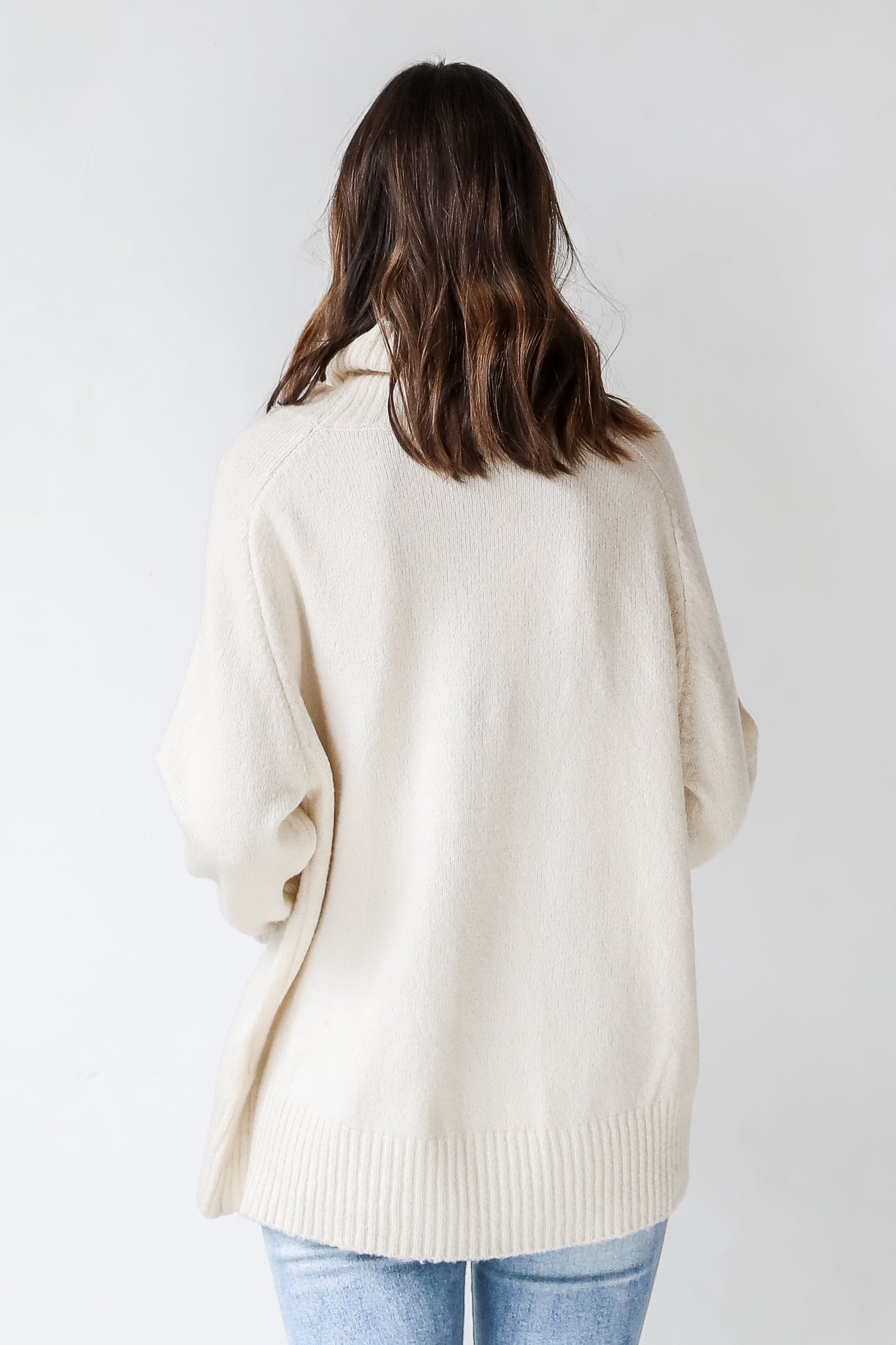 Turtleneck Sweater in ivory back view